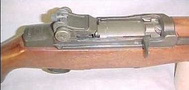  Close-up view on the receiver, bolt in closed position, charging handle and rear sight of the M1 Garand.