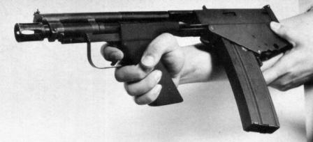  The IMP-221 / GUU-4/P individual multi-purpose weapon. Note that the pistol grip is canted to the side to provide comfortable hold.