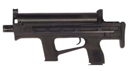 Early version of Chang Feng submachine gun chambered for 5.8x21 DAP58 ammunition; this weapon had dual feed option, with primary helical magazine located at the top of the receiver and secondary pistol-type magazine located in the rear grip.