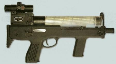 Current version of the Chang Feng submachine gun, chambered for ubiquitous 9x19 cartridge; secondary feed option with pistol magazine is omitted from design.Gun is fitted with red dot (collimating) sight.