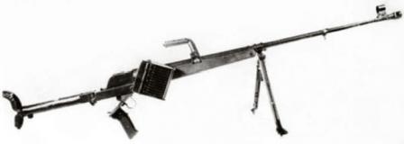 Pz.B.39 antitank rifle, with spare ammunition box attached to the gun. The pistol grip is dropped down to open the breech for reloading.