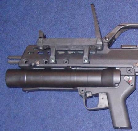 AG-36 grenade launcher mounted under the barrel of the HK G36C assault rifle.