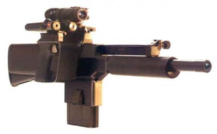 PAW-20 with night vision sight and laser pointer. Note that magazine projectswell below its housing.