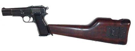 Browning High Power, also made by Inglis, but with tangent ajustable rear sights and attached holster/shoulder stock.