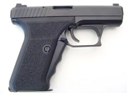 P7M8 pistol. Note magazine release lever in the base of the enlarged triggerguard, as well as heat shield above the trigger.
