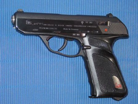 HK P9S pistol. Note the heel magazine release and a cocking/decoking lever behind the triggerguard.