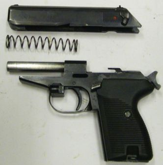 P-83 pistol, field stripped.