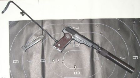 APB / 6P13 silenced pistol, with silencer and the shoulder stock attached. Target has been fired at from 25 meters distance in short bursts of 2 to 4 rounds each.