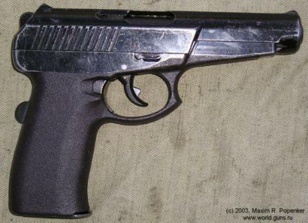 Same early production pistol. right side