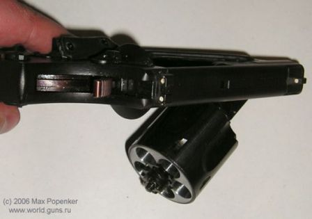 OTs-38 revolver, top view with cylinder opened for reloading. Note the most unusual way of cylinder opening.