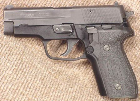 SIG-Sauer P228 pistol, left side.