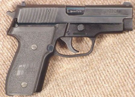 SIG-Sauer P228 pistol, right side.