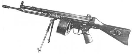 Early production 5,56x45mm HK 13light machine gun with 100-round double drum magazine.