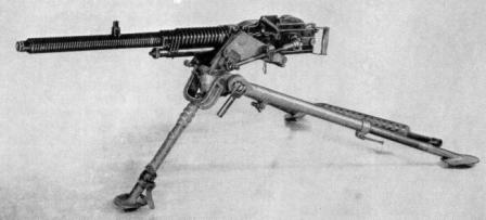 Hotchkiss model 1930 heavy machine gun, strip-fed version on infantry tripod.