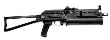 Early model of Bizon submachine gun, with AKS-74 type butt and pistol grip, andwith 64 rounds cylindrical magazine.