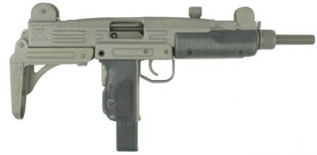  Uzi submachine gun with metallic buttstock in folded position.