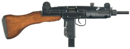  Uzi submachine gun with fixed (detachable) wooden buttstock.