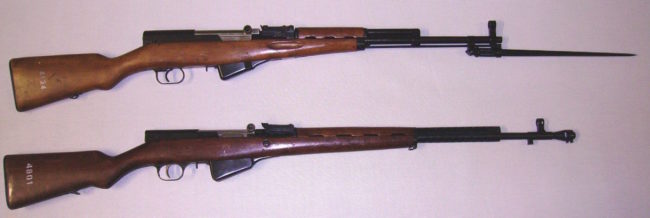 a very early 7.62x39mm SKS carbine with a spike bayonet (top) compared to the one of the prototype Simonov carbines chambered for the 7.62x54R, designed around 1940 or 1941